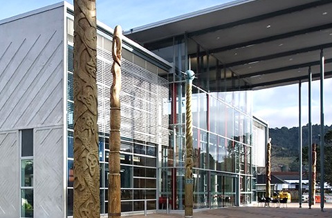 Picture of some of the pou outside Whangārei Central Library. 