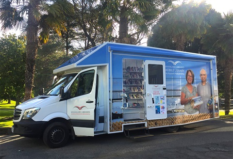 Photo of the mobile library at the park. 