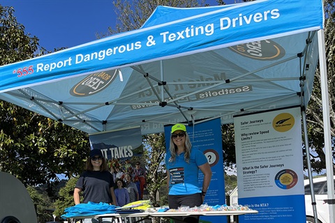 Members of the community road safety team at an information stall.