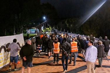 Guests walk through the new Lovers Lane and Bridge for the dawn opening.