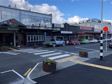 Vine Street traffic improvements are now complete with the raised platform transformed into an official pedestrian crossing, featuring new signs, lights and enhanced drainage.