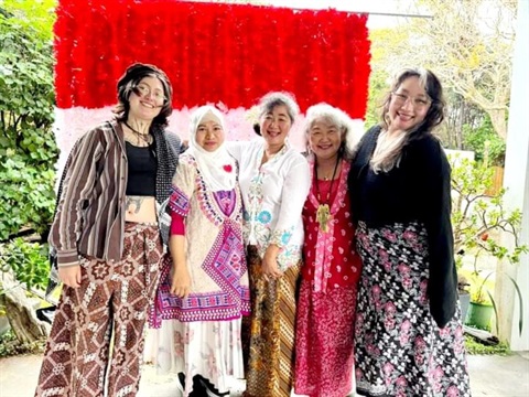 Image of local Indonesian women standing together. 