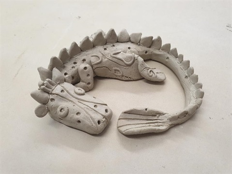 Image of a clay dragon. 