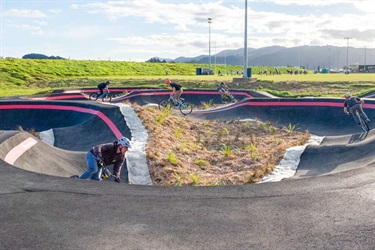 Cyclists on the Pump Track at Bike Park on Pohe Island.