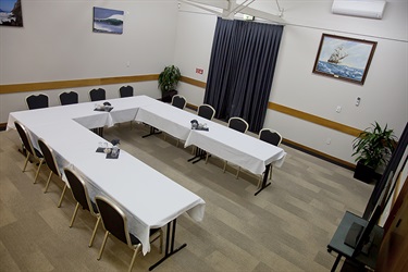 Bounty Room boardroom layout aerial shot with tables and chairs setup.