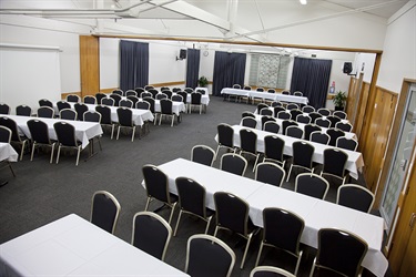 Cafler Suite in a banquet layout, aerial shot with tables and chairs setup.