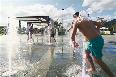 Enjoying water feature on a sunny day