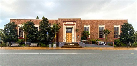 Front image of the old public library on Rust Avenue. 