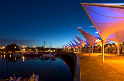 Whangarei's Canopy Bridge lit up at night. 