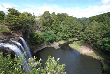 Aerial image of Otuihau Whangārei Falls showing the waterfall and water at the base.