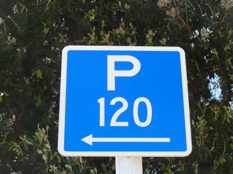 Image of a parking sign for Transport fees page.